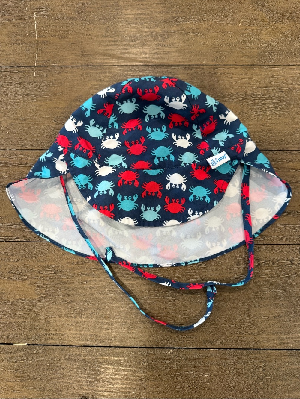 i play. Navy Sun Hat with Red, Teal, and White Crab Print